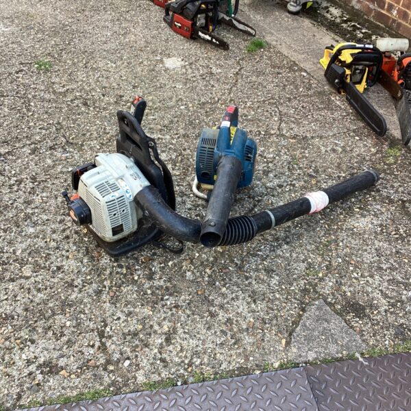 Two petrol leaf blowers for garden maintenance and clearing debris.
