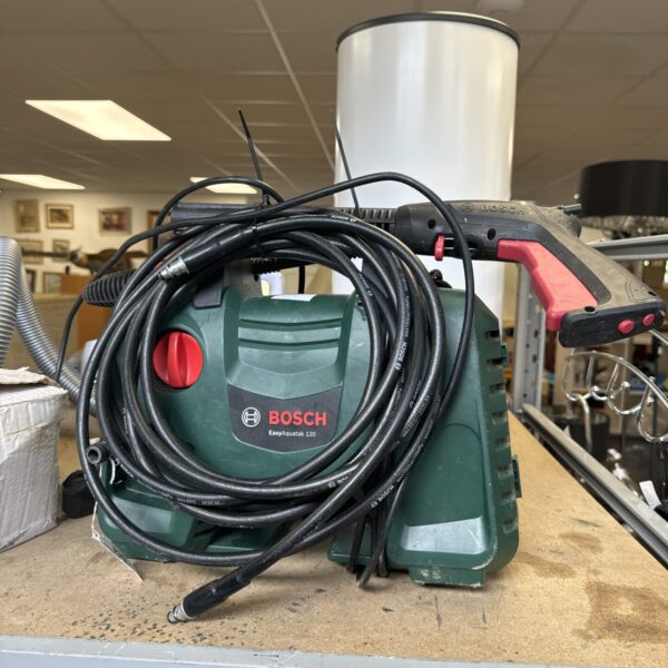 Bosch Easyaquatak 120 pressure washer with hose and lance.