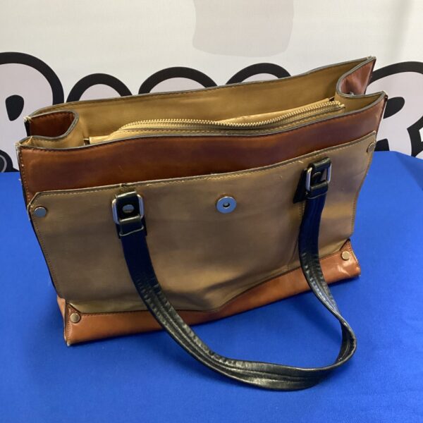 Vintage brown leather handbag with shoulder strap.
