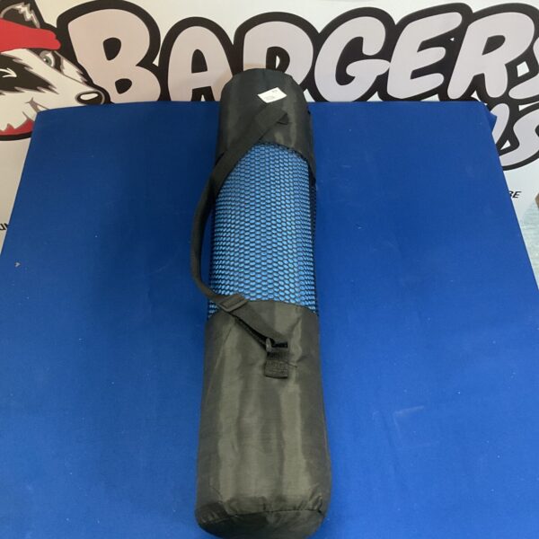 Black nylon yoga mat bag with drawstring closure.