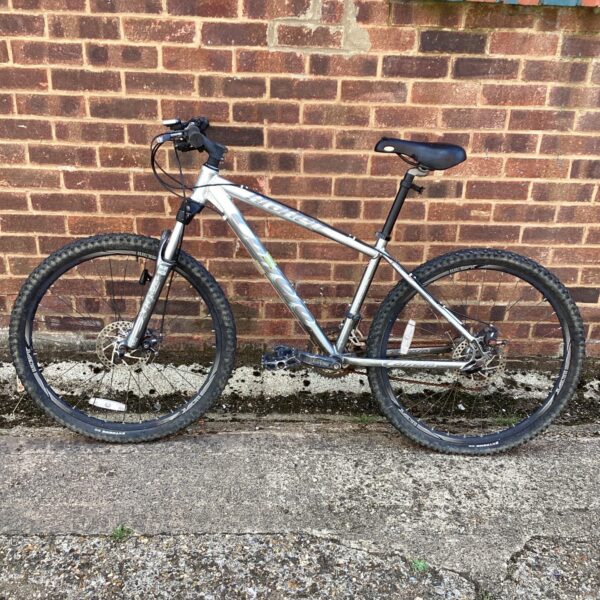 Silver Carrara Kraken mountain bike for off-road cycling.