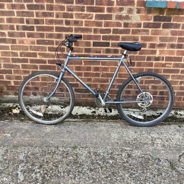 Side view of a vintage Raleigh Maverick mountain bike.