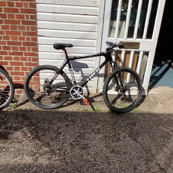 Vintage Trek mountain bike in need of repair, ideal for restoration.