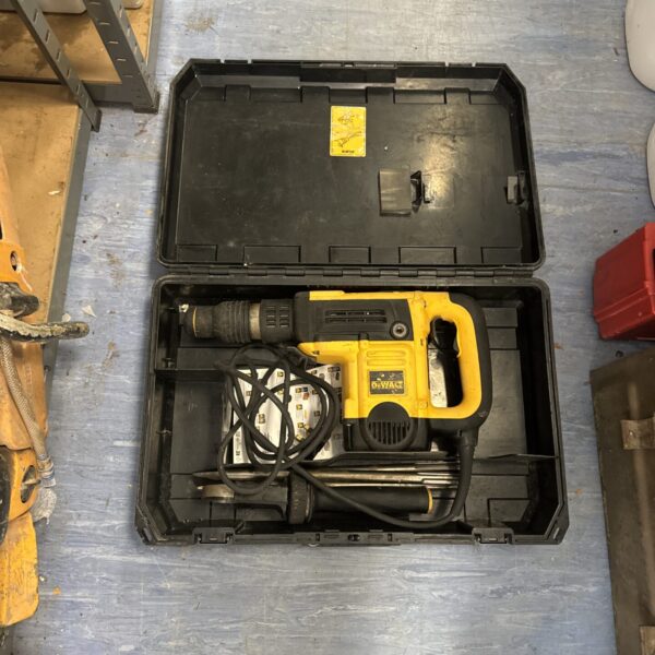 Dewalt D25820 breaker hammer drill in carrying case with chisels.