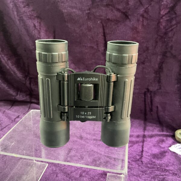 Compact Eurohike 10x25 binoculars for outdoor activities.