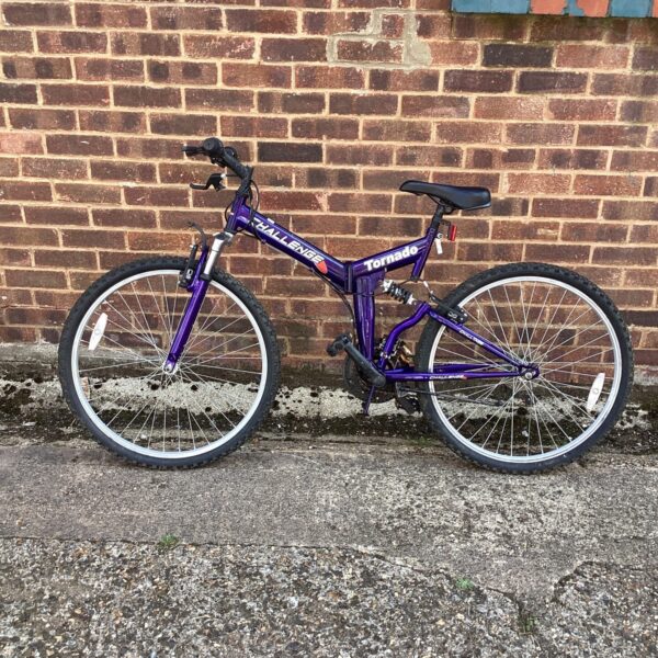 Purple Challenge Tornado folding bike in need of restoration.