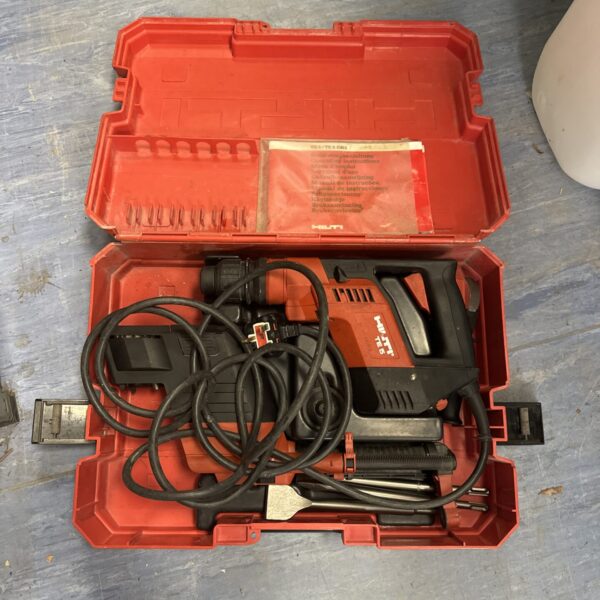 Hilti TE5 SDS drill in open carrying case, showing the tool.