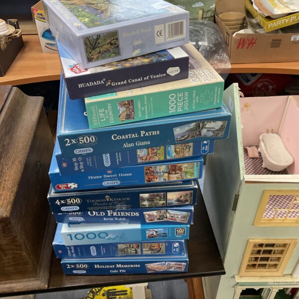 Vintage Gibson jigsaw puzzle lot with colourful boxes.