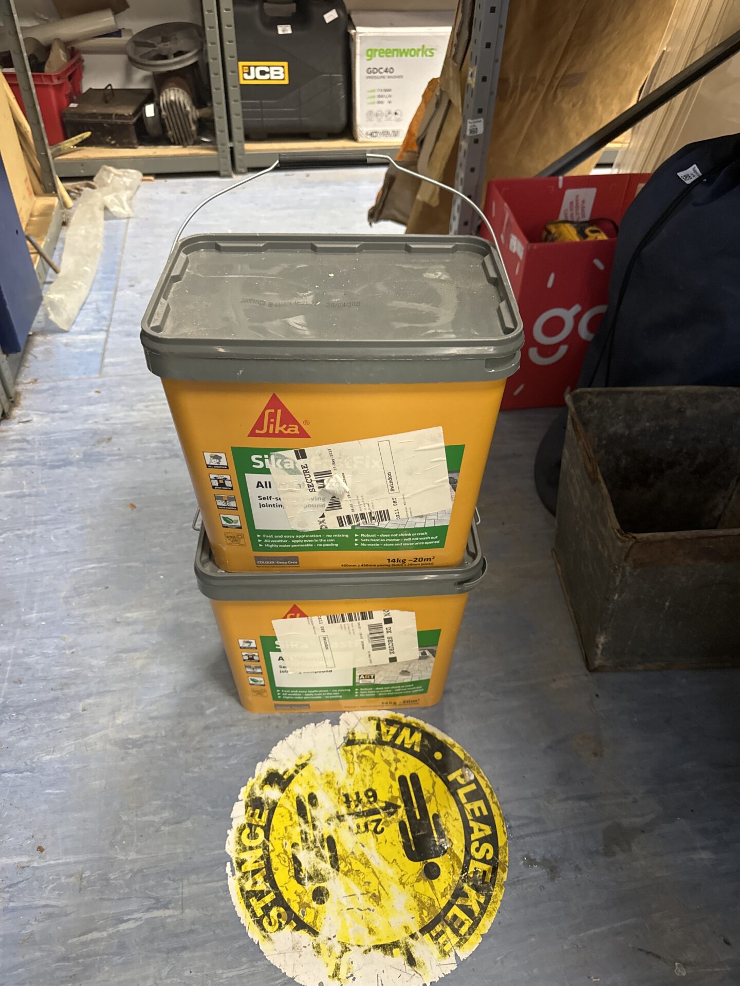 991 Two 14kg tubs of sika all weather jointing compound