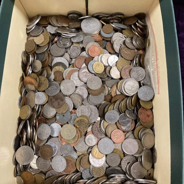 Mixed coin collection lot with vintage world currencies.