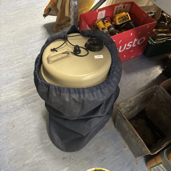 Blue Aquaroll water carrier for camping and outdoor use.