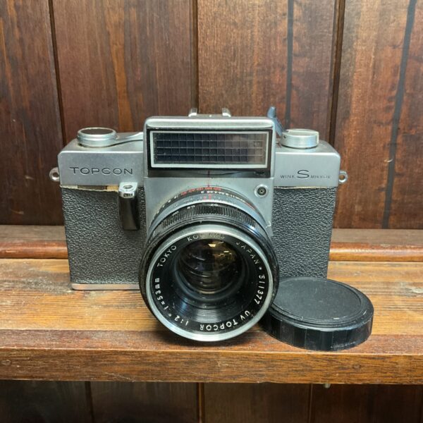Vintage Topcon Wink S Mirror camera, classic 35mm film photography.