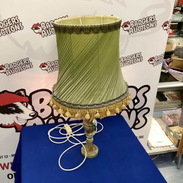 Vintage marble table lamp with green fabric shade.