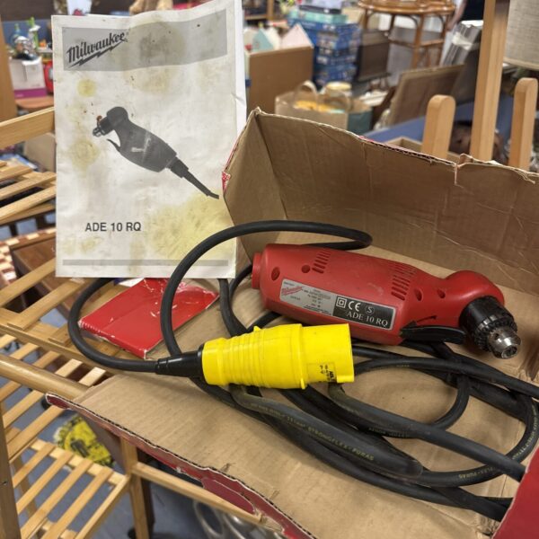 Vintage Milwaukee ADE 10 RQ angled drill, a classic power tool.