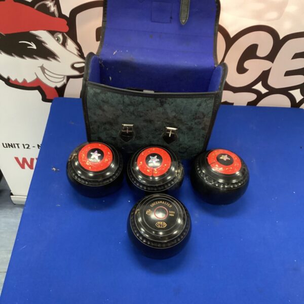Set of four Greenmaster bowling bowls for lawn bowling.