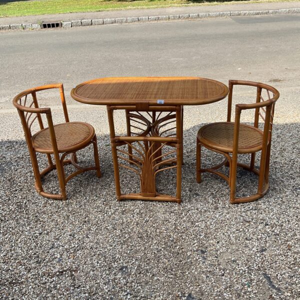 Vintage bamboo conservatory set with table and chairs.