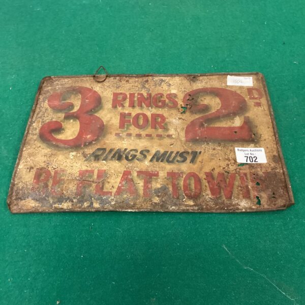 Vintage tin advertising sign reading “3 Rings for 2”