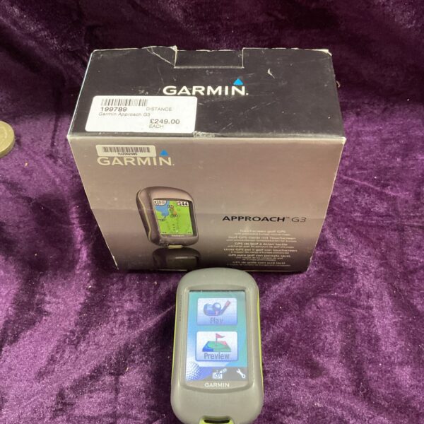 Garmin Approach G3 touchscreen golf GPS device on display.