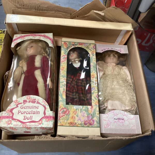 Boxed vintage porcelain dolls, collectible doll lot, antique toys.