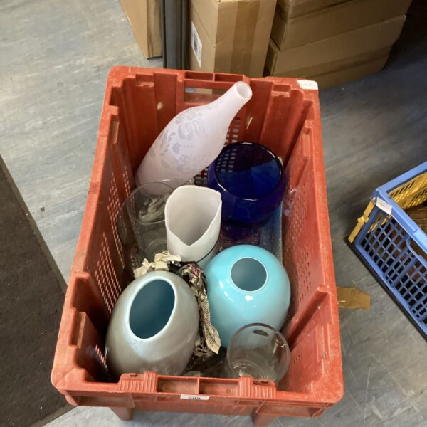 Assorted vintage glass vases in a mixed lot for home decor.