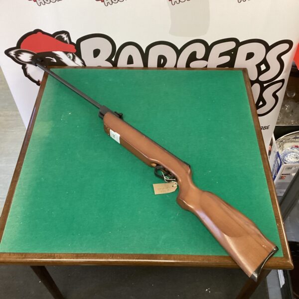 Vintage .177 calibre air rifle with wooden stock and lever action.