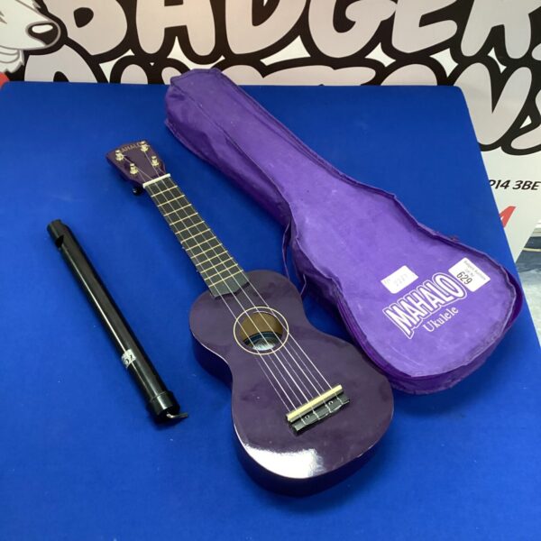 Vintage Mahalo ukulele with whistle, musical instrument for collectors.