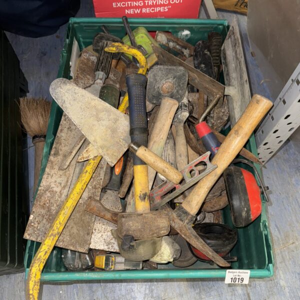 Assorted groundworkers tools including trowels and chisels.