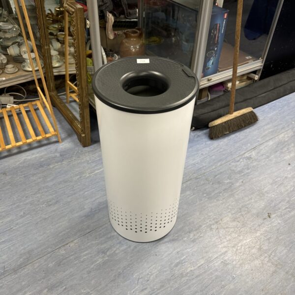 Silver Brabantia open-topped bin for kitchen waste disposal.