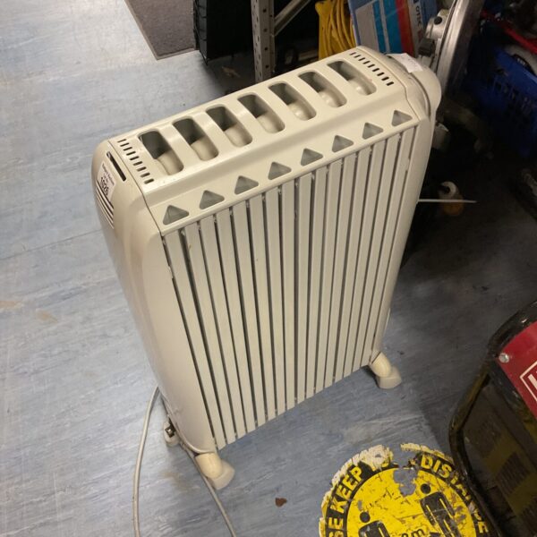 White DeLonghi electric heater, oil filled radiator for home use.