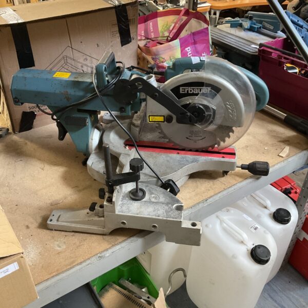 Used Erbauer slide saw for woodworking projects.