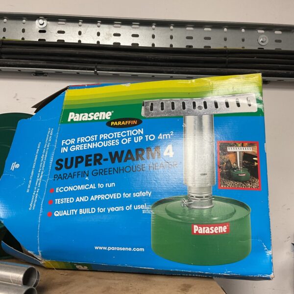 Vintage Parasene PA4 paraffin greenhouse heater for garden use.