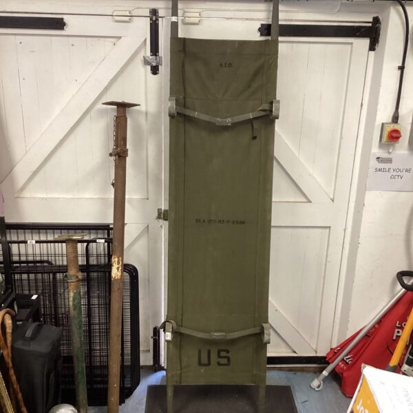 Vintage US Army stretcher in good condition, ideal for collectors.