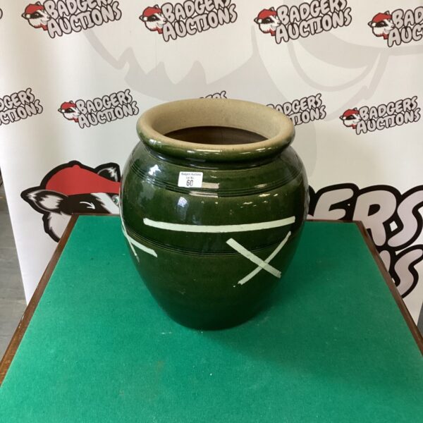 Large earthenware garden pot for outdoor plants and garden decor.
