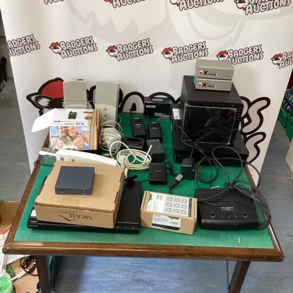 Mixed electrical lot with vintage walkie talkies and assorted electronics.