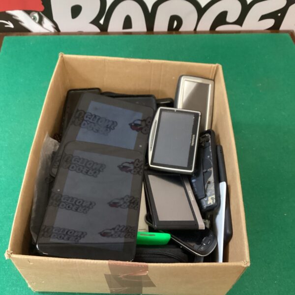 Mixed electronics lot featuring a TomTom GPS and mini tablets.