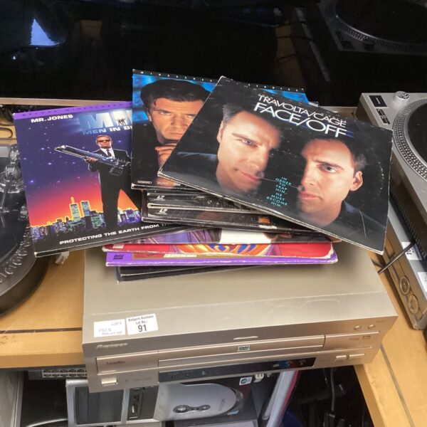 Pioneer laserdisc player with Men in Black laserdisc.