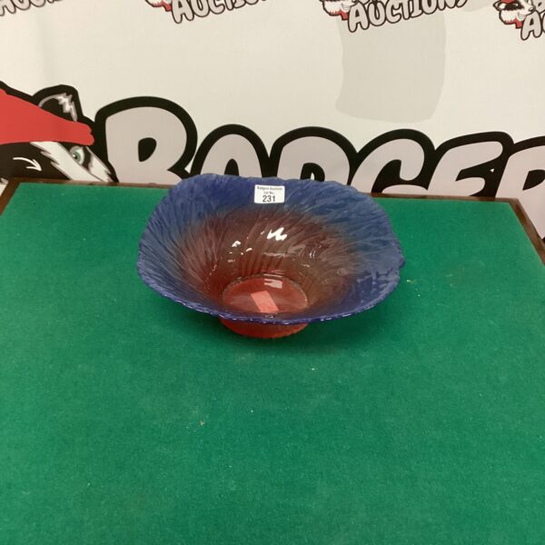 Vintage Metsa bowl with orange and brown swirl pattern.
