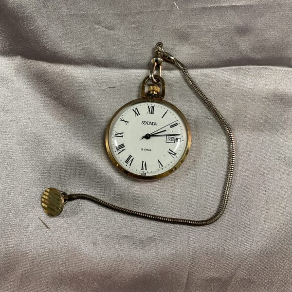 Vintage Sekonda pocket watch with silver fob chain for collectors.