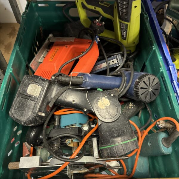 Untested Makita drill and sander in a power tool lot for DIY projects.