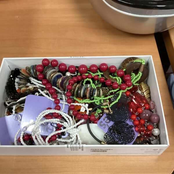 Colourful costume jewellery lot with beaded necklaces and fashion accessories.