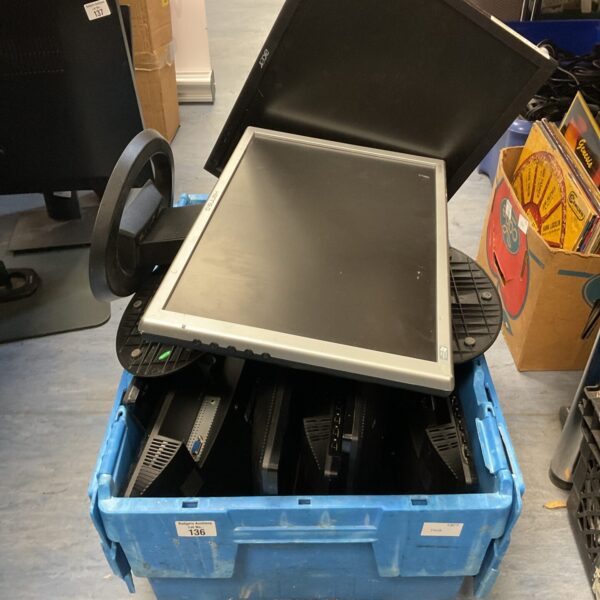 Lot of eight computer monitors in a plastic container.