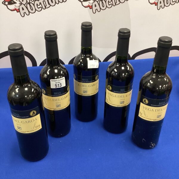 Five bottles of Vega Del Garoa red wine from 2015.