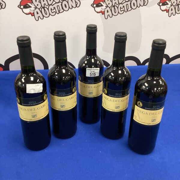 Five bottles of Vega Del Garoa red wine from 2015.