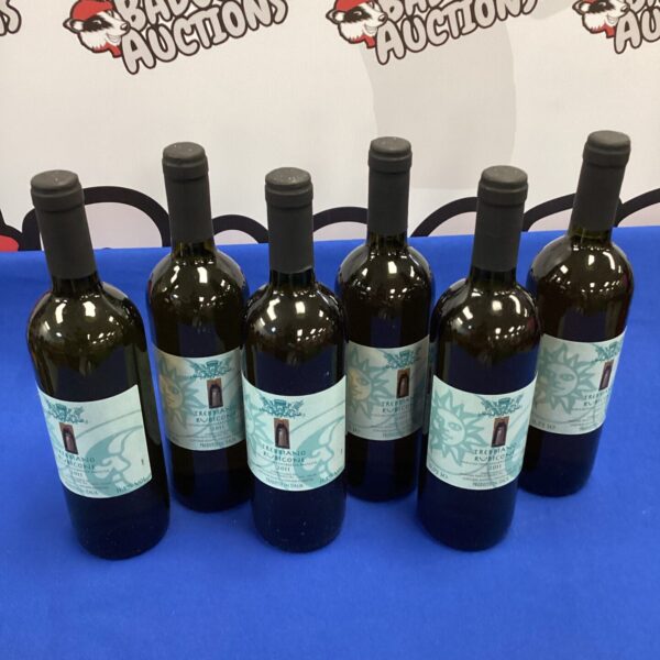 Six bottles of 2011 Trebbiano Rubicone Italian wine presented for auction.