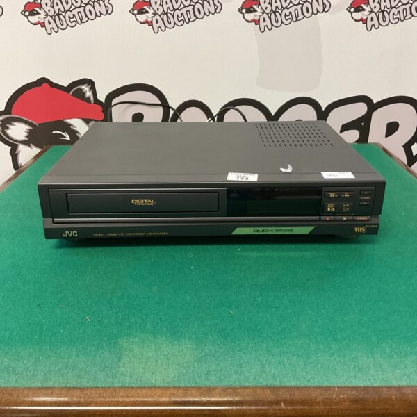 Front view of vintage JVC video cassette recorder.