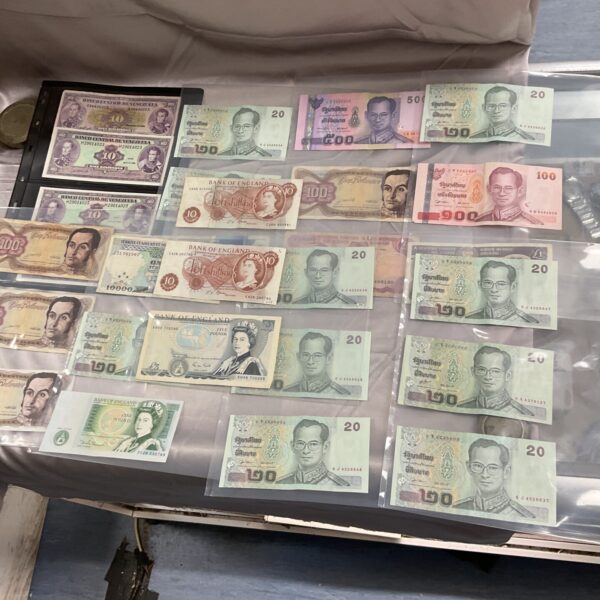 Assorted banknote collection featuring various world currencies.