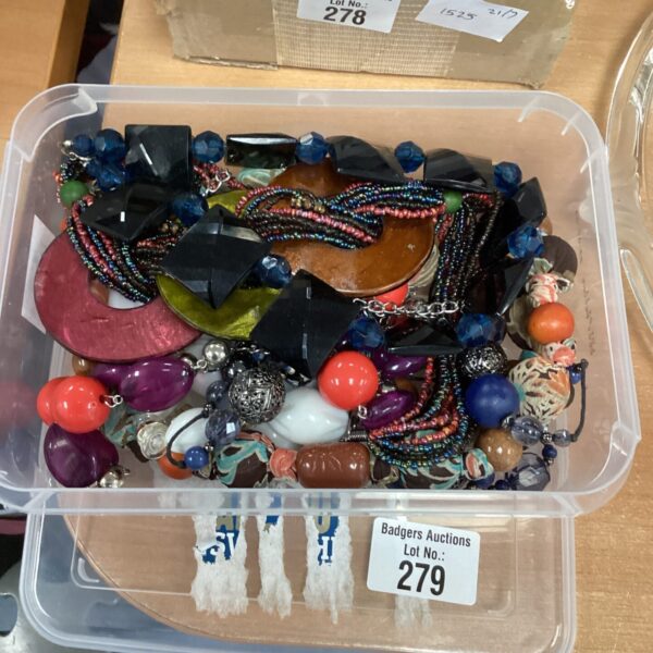 Mixed lot of colourful costume jewellery and beads.