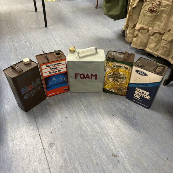 Vintage motoring cans collection, featuring Mobil brand.