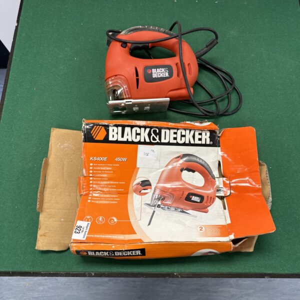 Vintage Black & Decker KS400E jigsaw power tool in used condition.