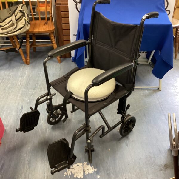 Careco wheelchair with swivel seat for mobility assistance.